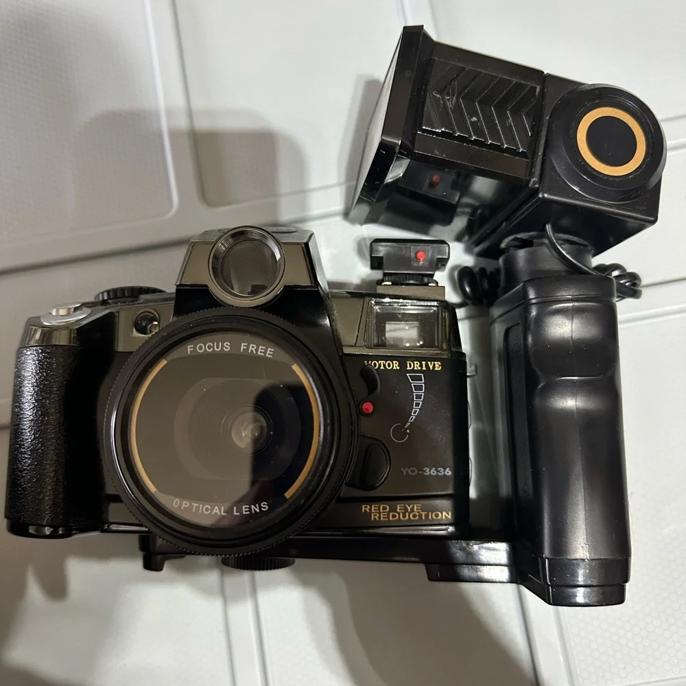 Vintage Canon Motor Drive Red Eye Reduction Black Camera with flash